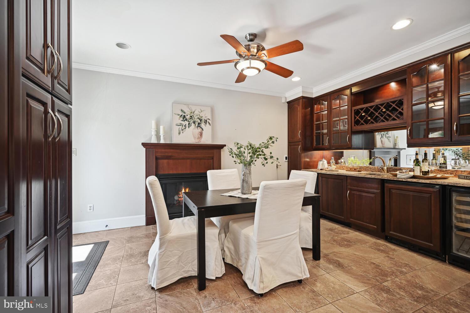 404 Pershing Drive Silver Spring, MD 20910 - Photo 6 of 37 Dining area with fireplace and wet bar