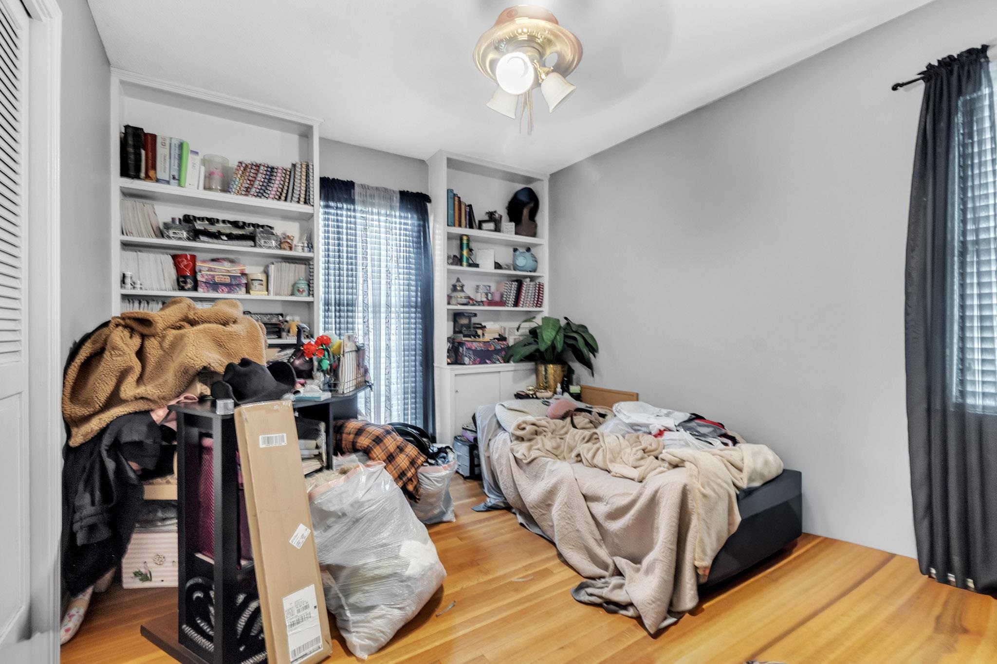 3595 Huckleberry Street Memphis, TN 38116 - Photo 12 of 19 a bedroom with bed and a closet