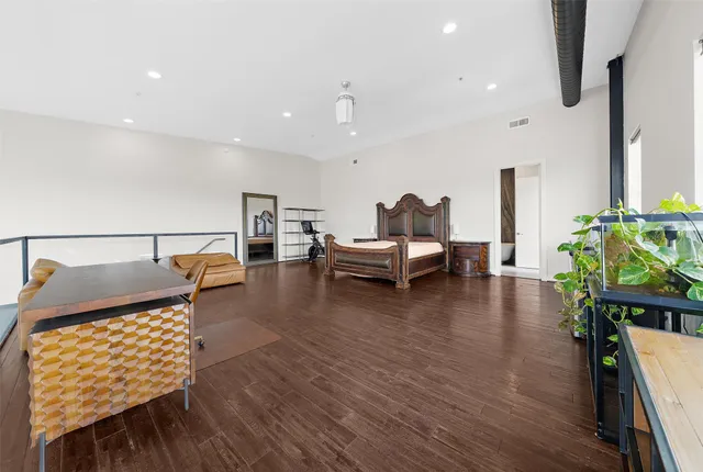 a bathroom with a sink a toilet a shower and a mirror