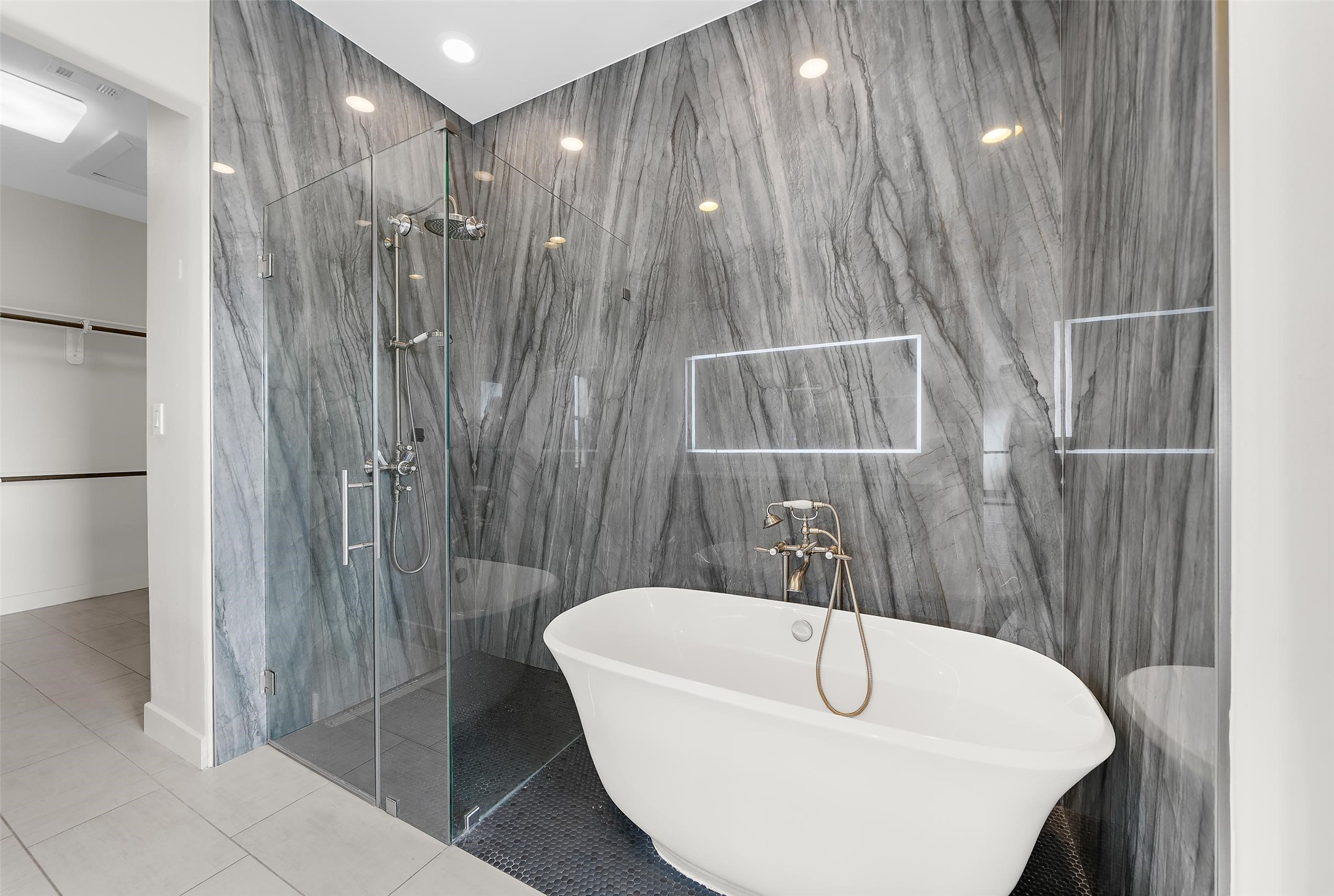 2323 Polk Street, Unit 306 Houston, TX 77003 - Photo 14 of 32 a bathroom with a sink a toilet and shower
