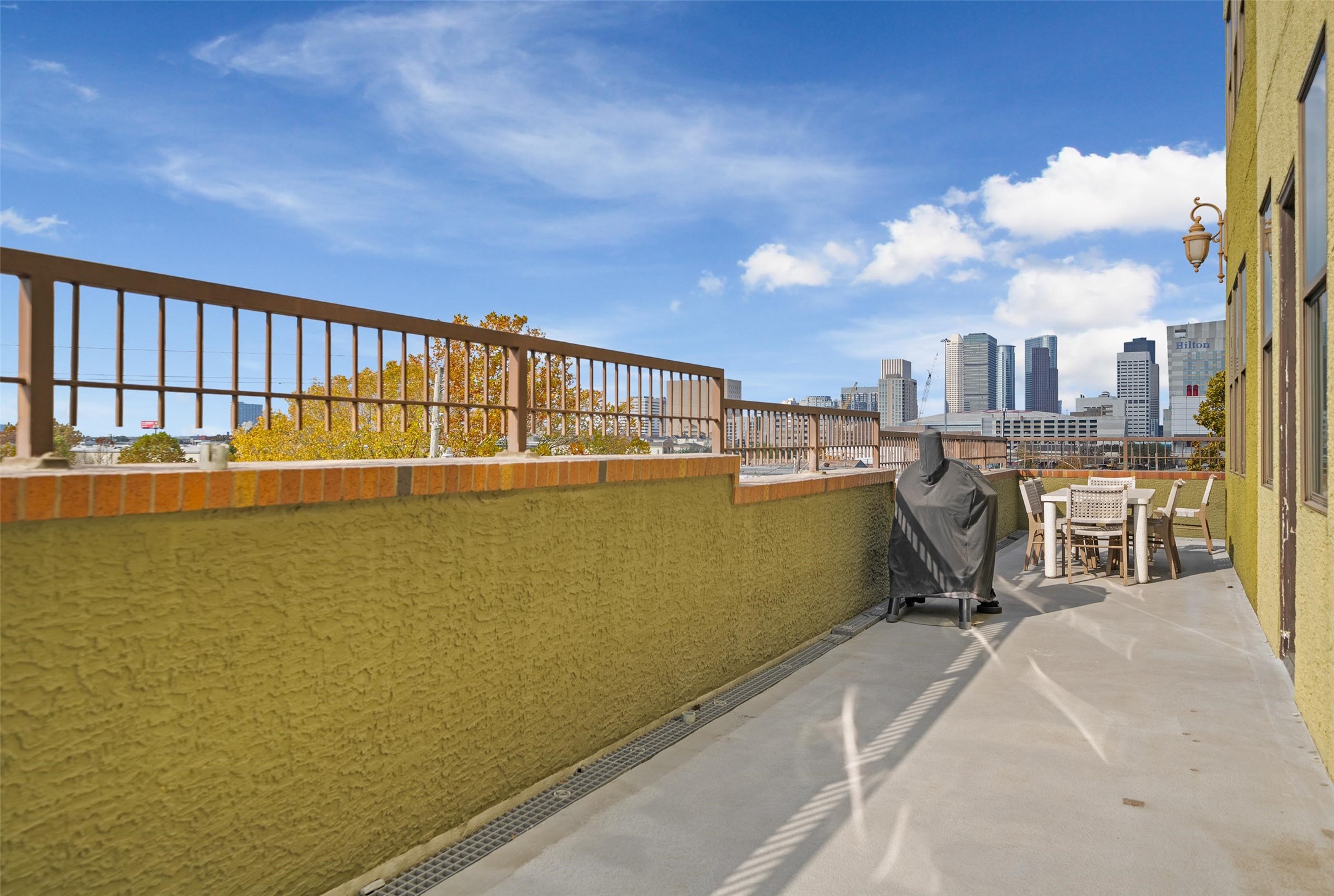 2323 Polk Street, Unit 306 Houston, TX 77003 - Photo 22 of 32 a view of a swimming pool with outdoor seating