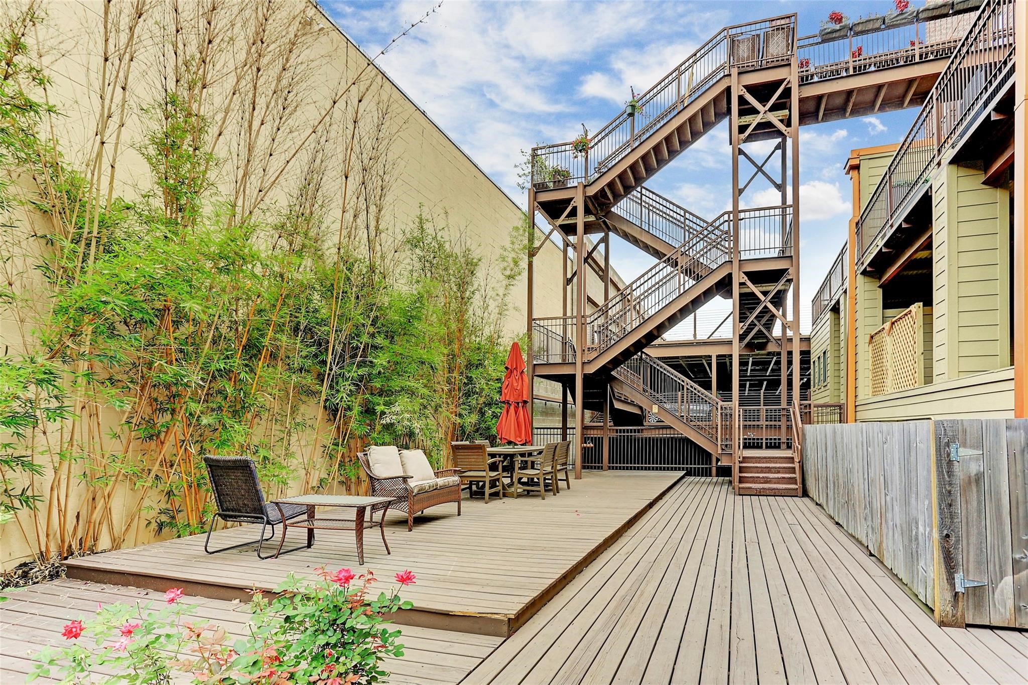 2323 Polk Street, Unit 306 Houston, TX 77003 - Photo 29 of 32 a view of deck with patio