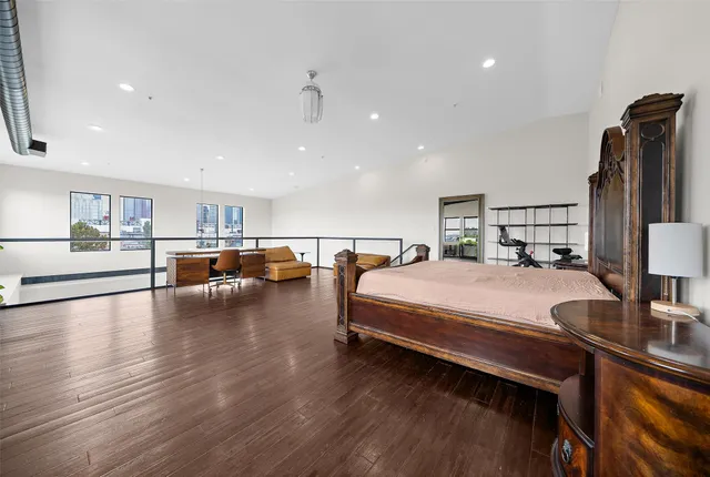 a bed room with bed and window