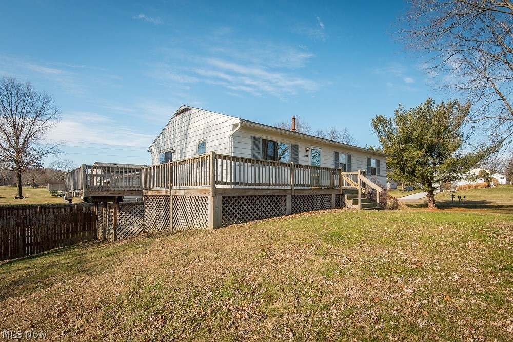 4812 Jupiter Road Akron, OH 44319 - Photo 2 of 24 The porch wraps around to the large deck
