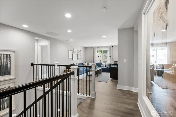 a white stove top oven sitting inside of a kitchen