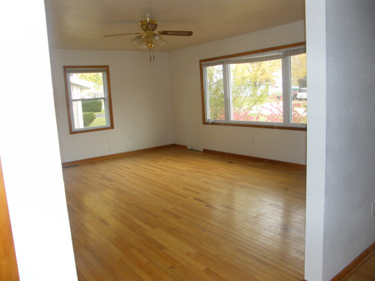 6936 South Sarah Avenue Rochelle, IL 61068 - Photo 3 of 10 a view of an empty room with a window