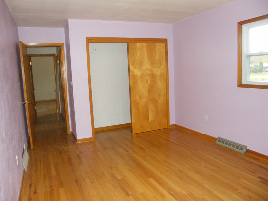 6936 South Sarah Avenue Rochelle, IL 61068 - Photo 6 of 10 a view of an empty room with a window