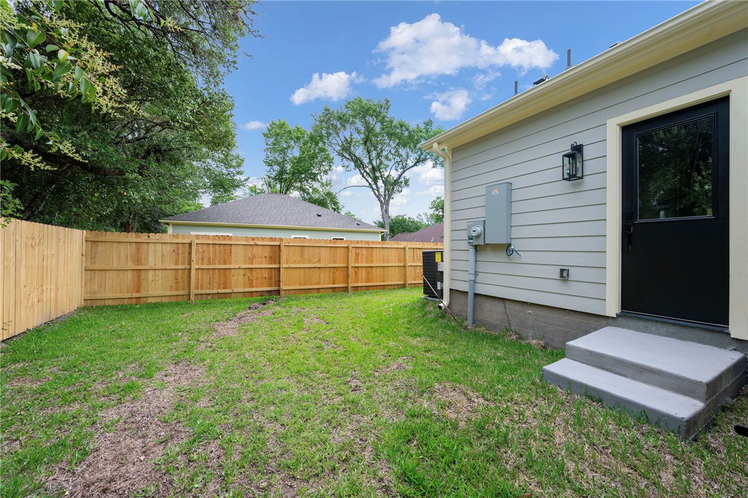 804 East 27th Street Bryan, TX 77803 - Photo 20 of 21 a view of a backyard with stairs