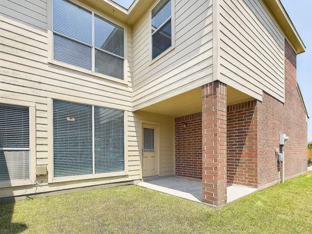 a front view of a house with a garage