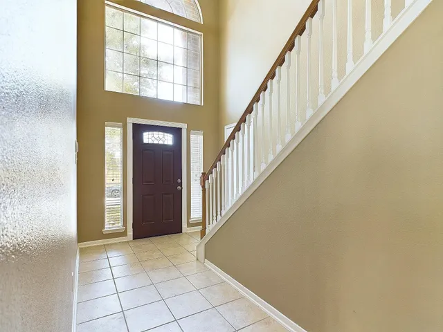 a view of an entryway with staircase