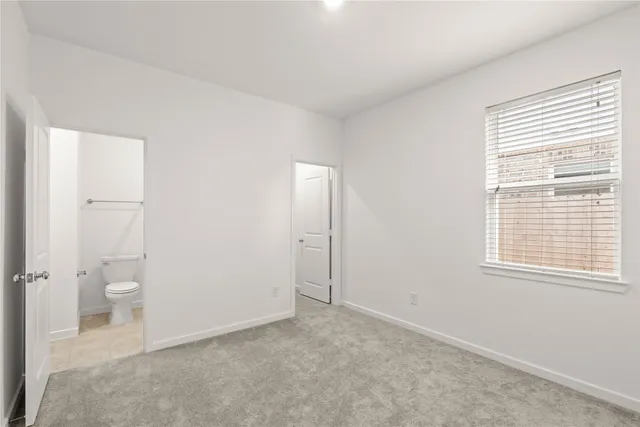 a bathroom with a toilet