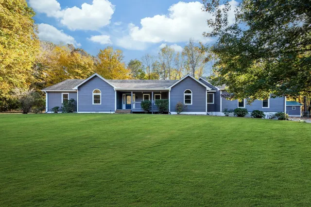 a house view with a garden space