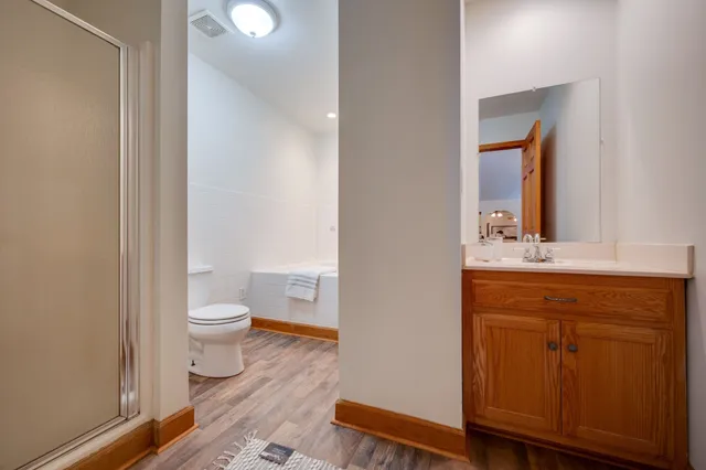 a view of a workspace with furniture