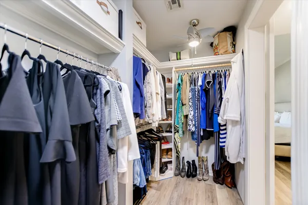 a view of a house with a backyard porch and sitting area