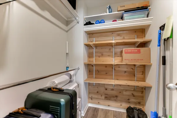 a view of a park with iron fence