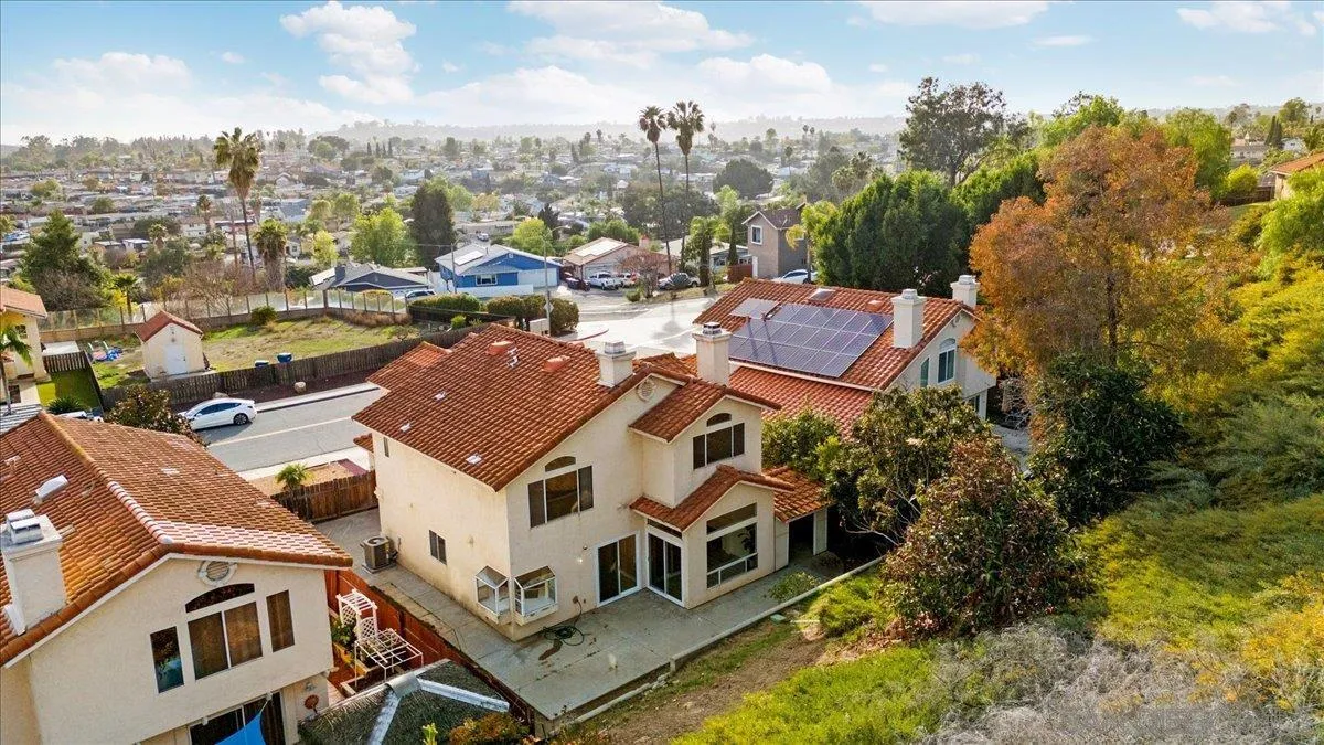 9704 Avenida Ricardo Spring Valley, CA 91977 - Photo 52 of 52 an aerial view of multiple houses with a yard
