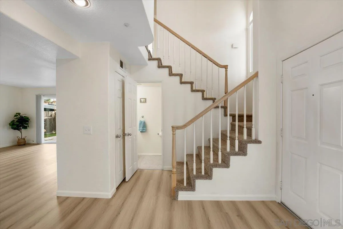 9704 Avenida Ricardo Spring Valley, CA 91977 - Photo 10 of 52 a view of entryway and hall with wooden floor