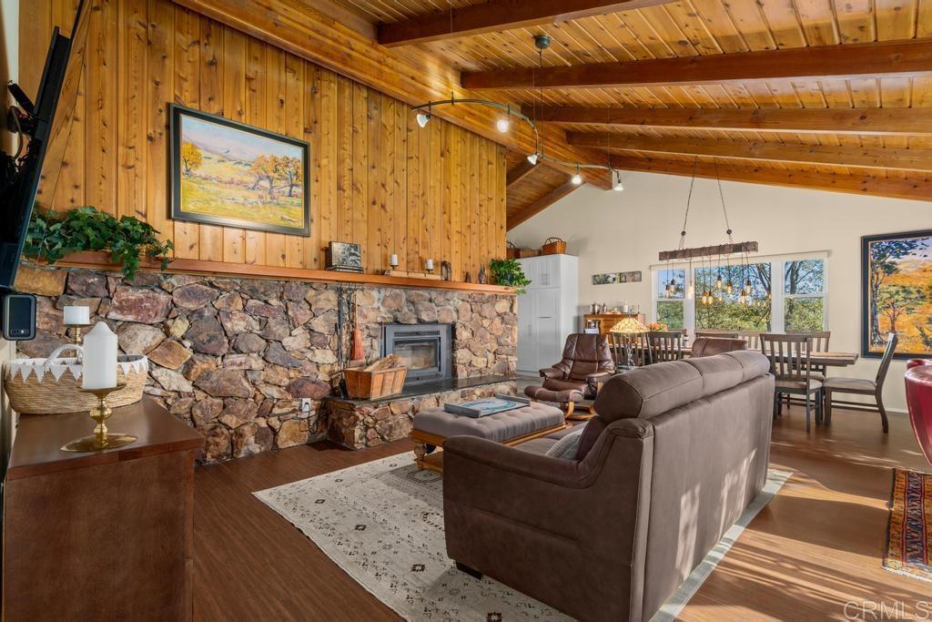 25443 Mesa Grande Road Santa Ysabel, CA 92070 - Photo 15 of 68 a living room with furniture and a fireplace