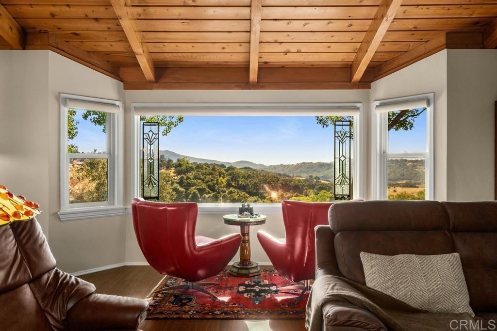 25443 Mesa Grande Road Santa Ysabel, CA 92070 - Photo 19 of 68 a living room with furniture and a large window