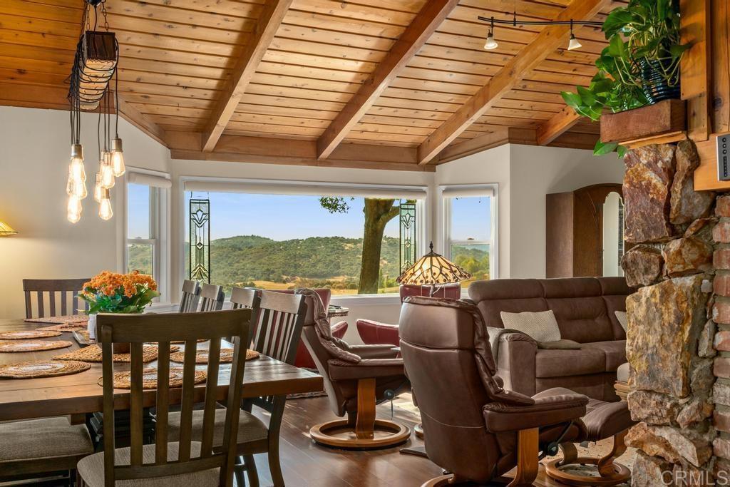 25443 Mesa Grande Road Santa Ysabel, CA 92070 - Photo 21 of 68 a view of a patio with couches chairs dining table and chairs