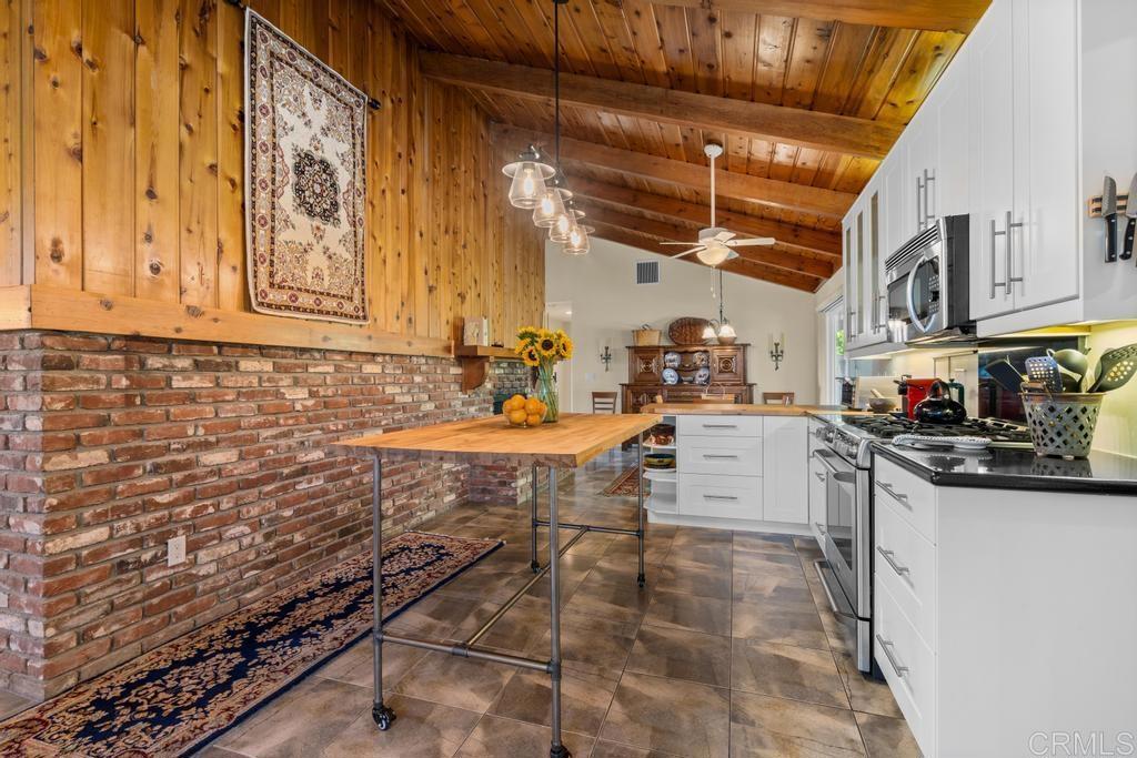 25443 Mesa Grande Road Santa Ysabel, CA 92070 - Photo 25 of 68 a kitchen with stainless steel appliances granite countertop a sink and cabinets