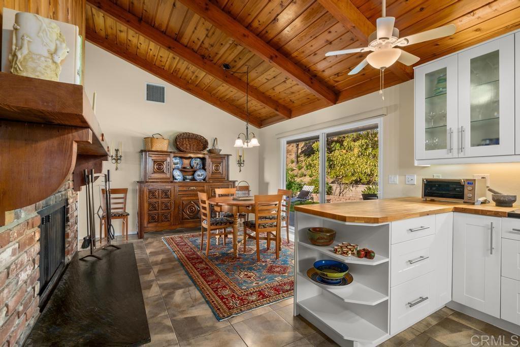25443 Mesa Grande Road Santa Ysabel, CA 92070 - Photo 26 of 68 a open kitchen with stainless steel appliances granite countertop a sink a stove and a refrigerator