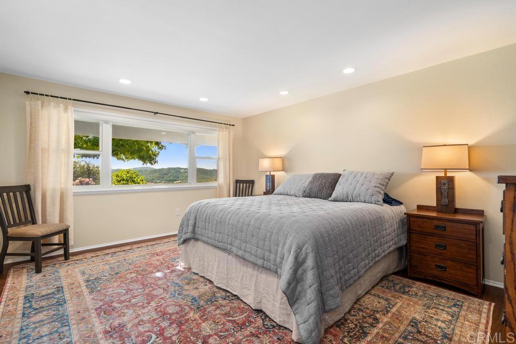 25443 Mesa Grande Road Santa Ysabel, CA 92070 - Photo 32 of 68 a bed room with a bed and a chair