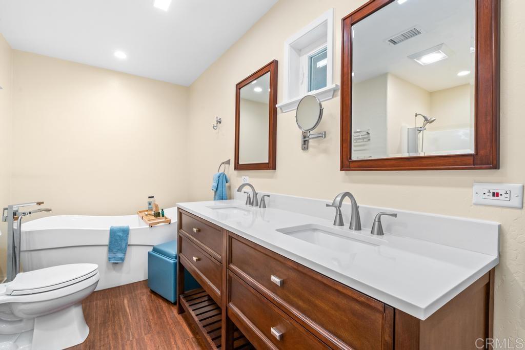 25443 Mesa Grande Road Santa Ysabel, CA 92070 - Photo 34 of 68 a bathroom with a sink a toilet and mirror