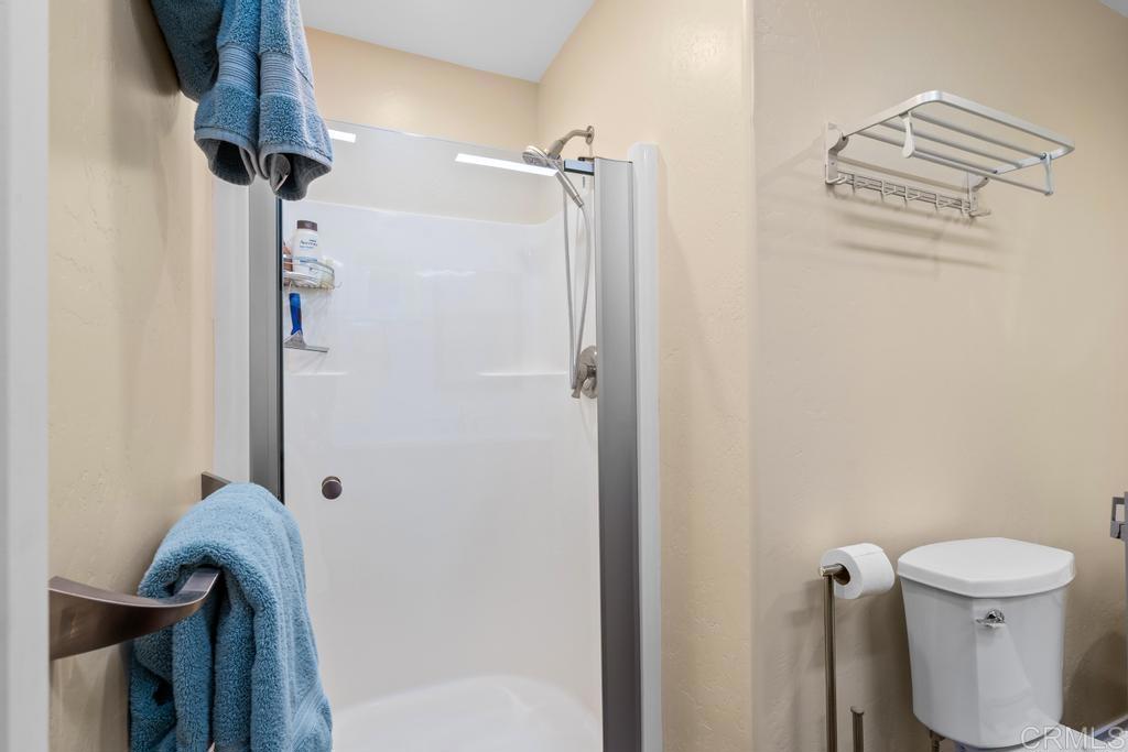 25443 Mesa Grande Road Santa Ysabel, CA 92070 - Photo 35 of 68 a bathroom with a toilet and a shower