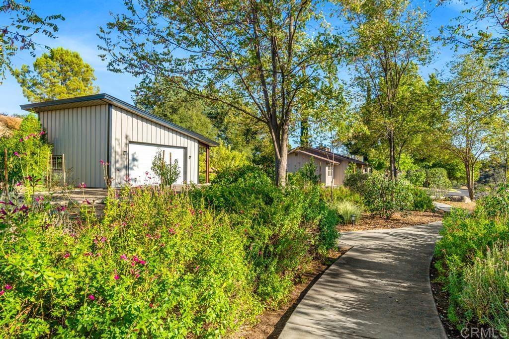 25443 Mesa Grande Road Santa Ysabel, CA 92070 - Photo 4 of 68 a front view of a house with garden