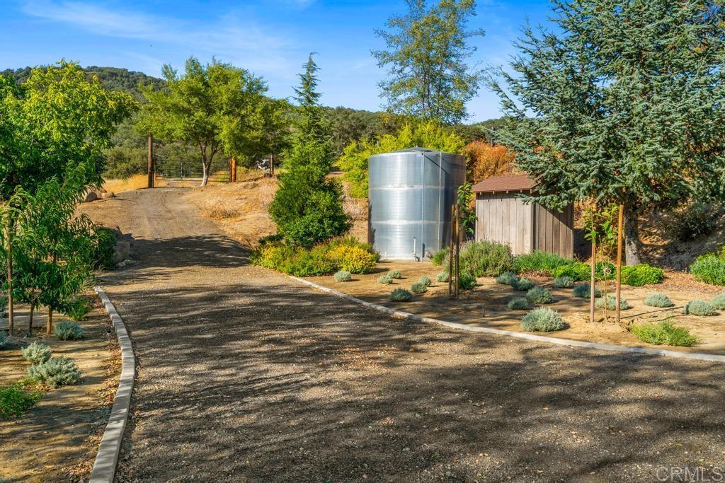25443 Mesa Grande Road Santa Ysabel, CA 92070 - Photo 44 of 68 a view of a house with a yard