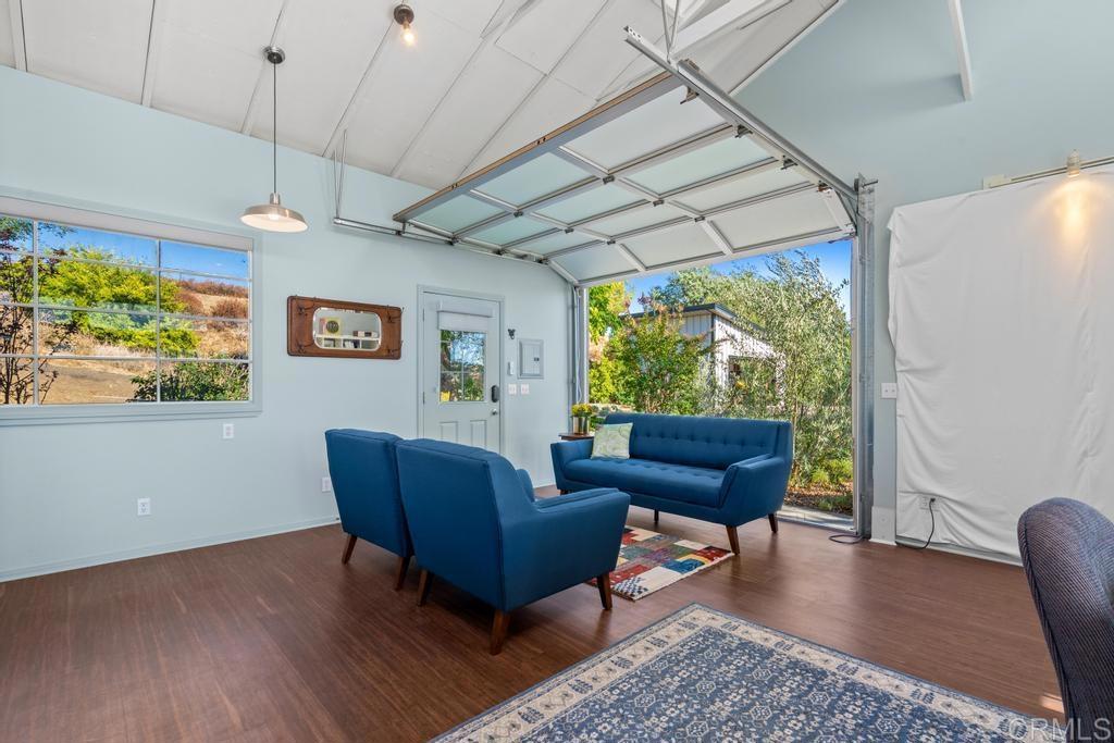 25443 Mesa Grande Road Santa Ysabel, CA 92070 - Photo 50 of 68 a living room with furniture and a large window