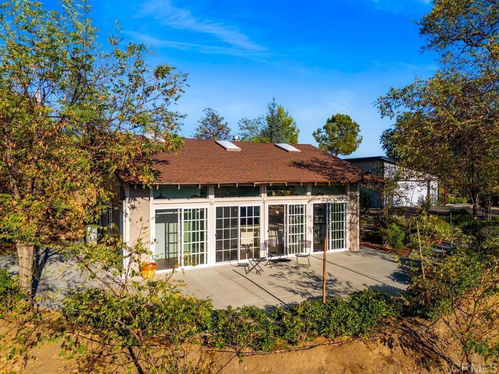 25443 Mesa Grande Road Santa Ysabel, CA 92070 - Photo 5 of 68 a house view with a garden space