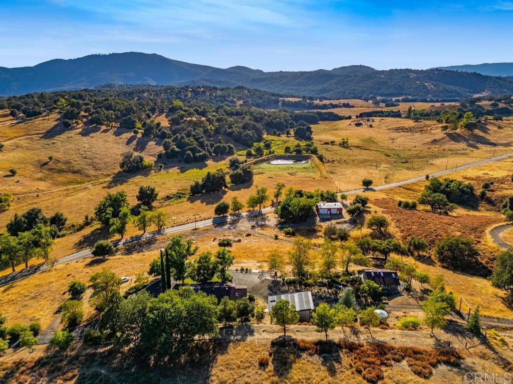 25443 Mesa Grande Road Santa Ysabel, CA 92070 - Photo 8 of 68 a view of a city with mountains in the background