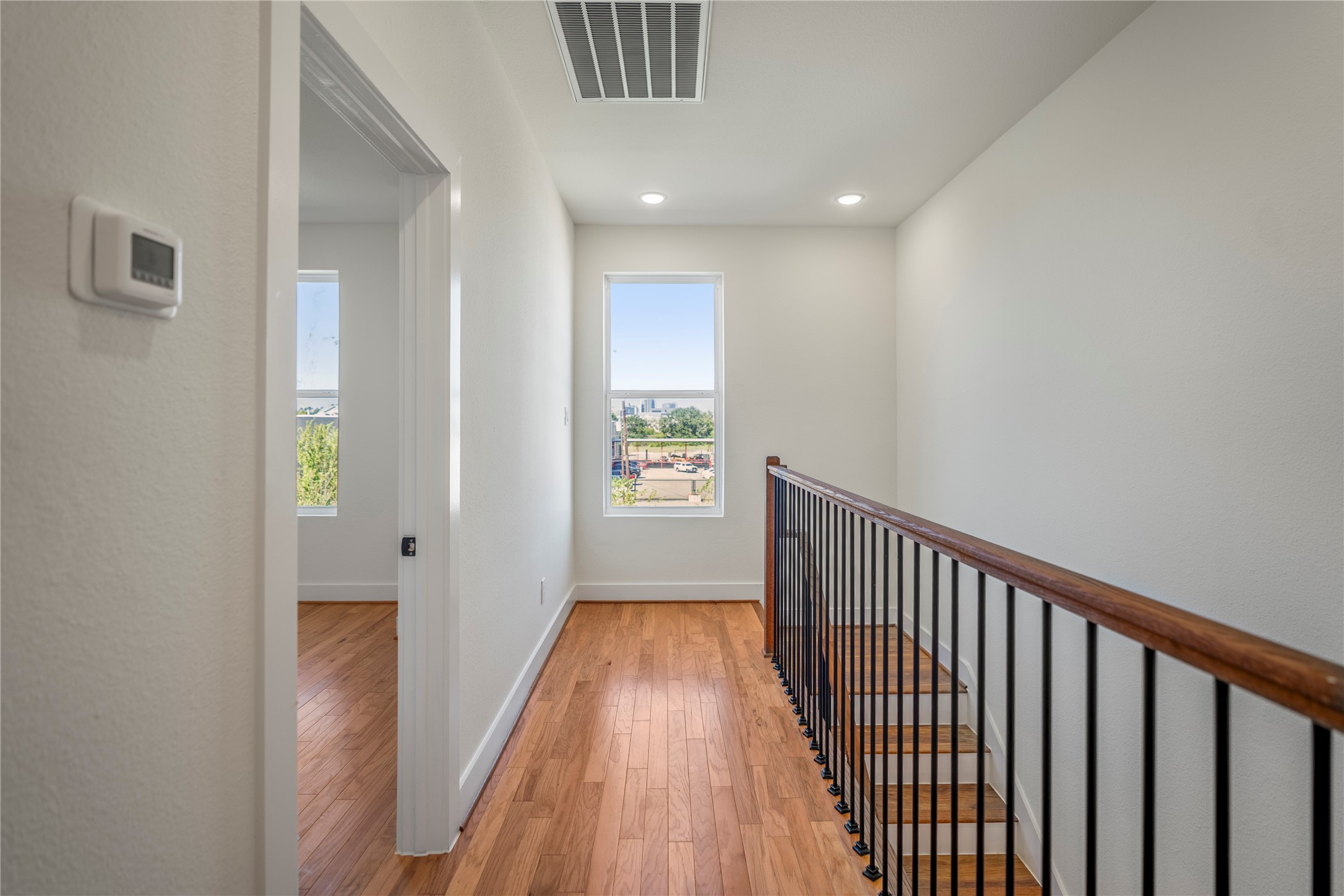 6324 Del Rio Street Houston, TX 77021 - Photo 31 of 50 a view of a hallway with wooden floor