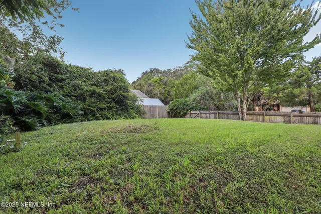 a picture of door with an open kitchen