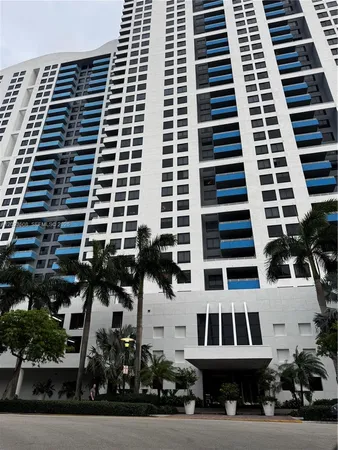a view of parking space and building