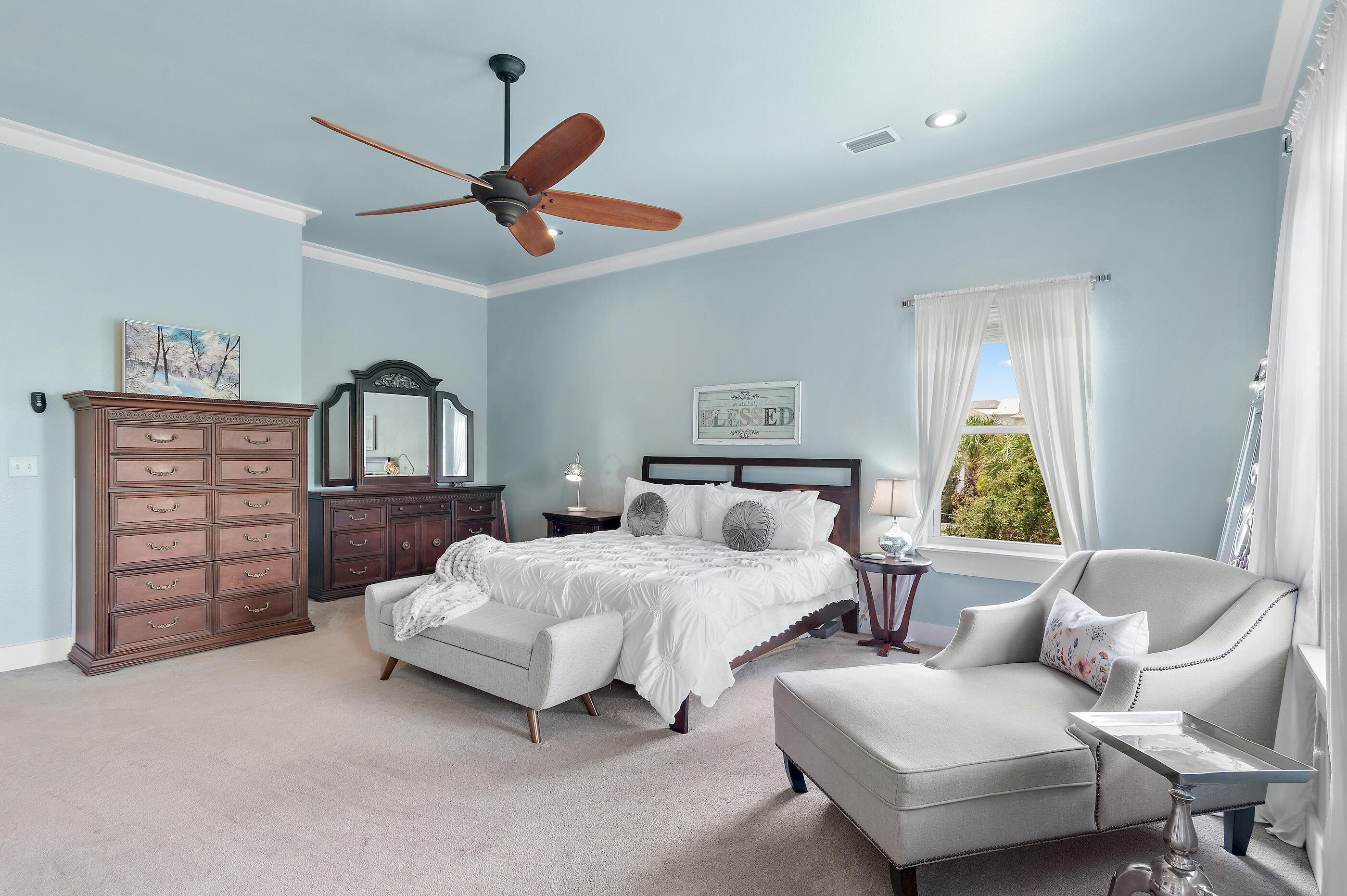 96 Hilltop Drive Santa Rosa Beach, FL 32459 - Photo 19 of 50 a bedroom with furniture and a chandelier