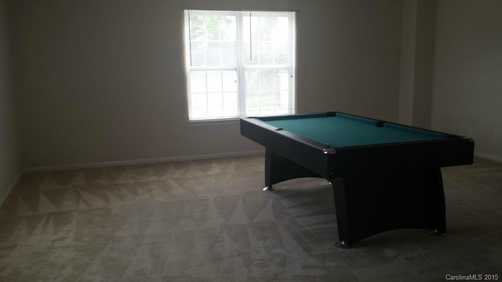 640 Cliffs Inn Circle Charlotte, NC 28214 - Photo 8 of 11 a room with a table and a window