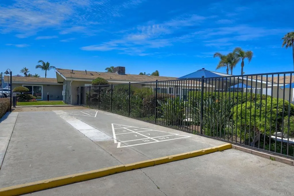 6550 Ponto, Unit 78 Carlsbad, CA 92011 - Photo 29 of 33 a view of swimming pool with lawn chairs and potted plants