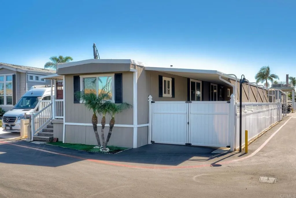 6550 Ponto, Unit 78 Carlsbad, CA 92011 - Photo 4 of 33 a view of a house with a street