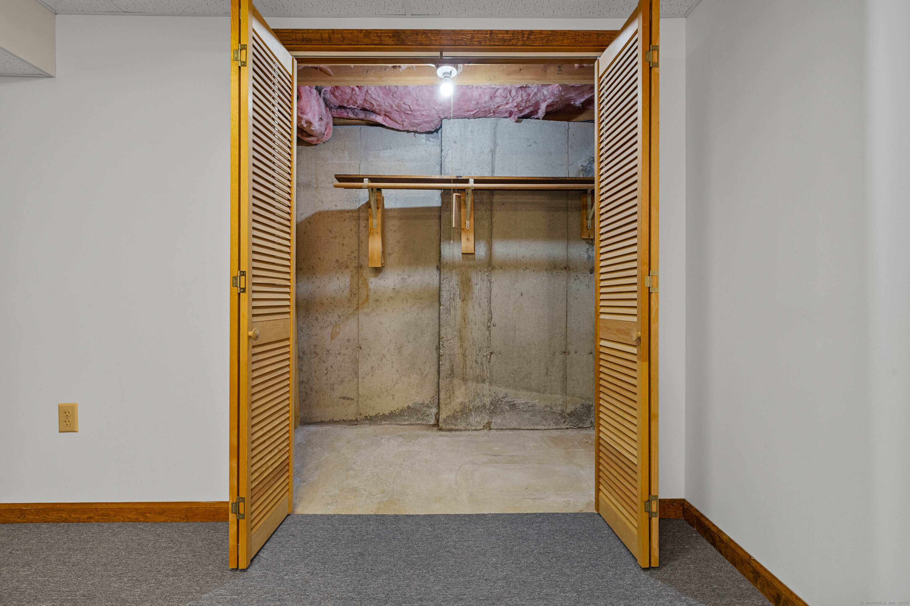 226 Austin Ryer Lane, Unit 226 Branford, CT 06405 - Photo 27 of 34 a bathroom with a glass door shower