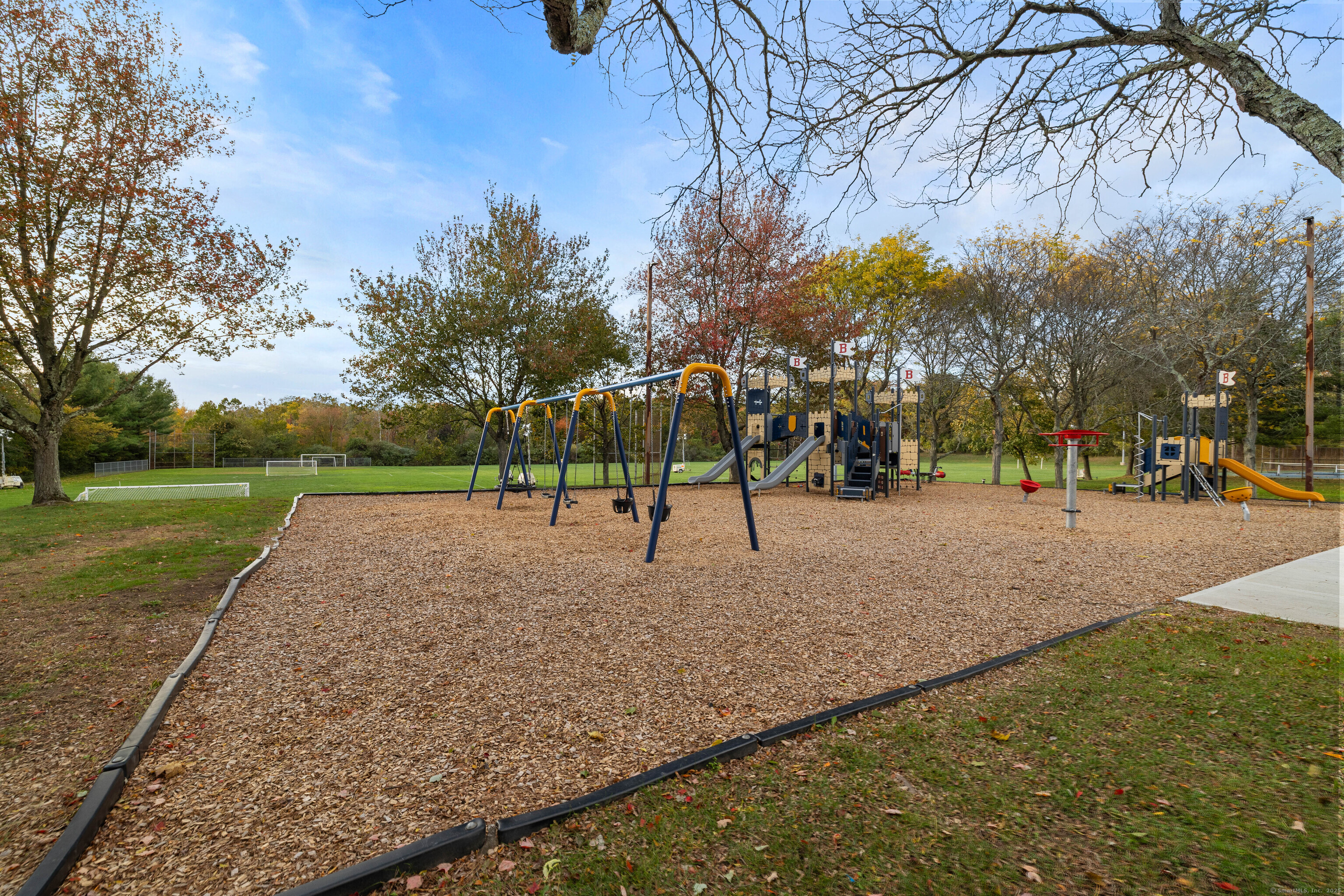 226 Austin Ryer Lane, Unit 226 Branford, CT 06405 - Photo 31 of 34 a view of outdoor space with trees