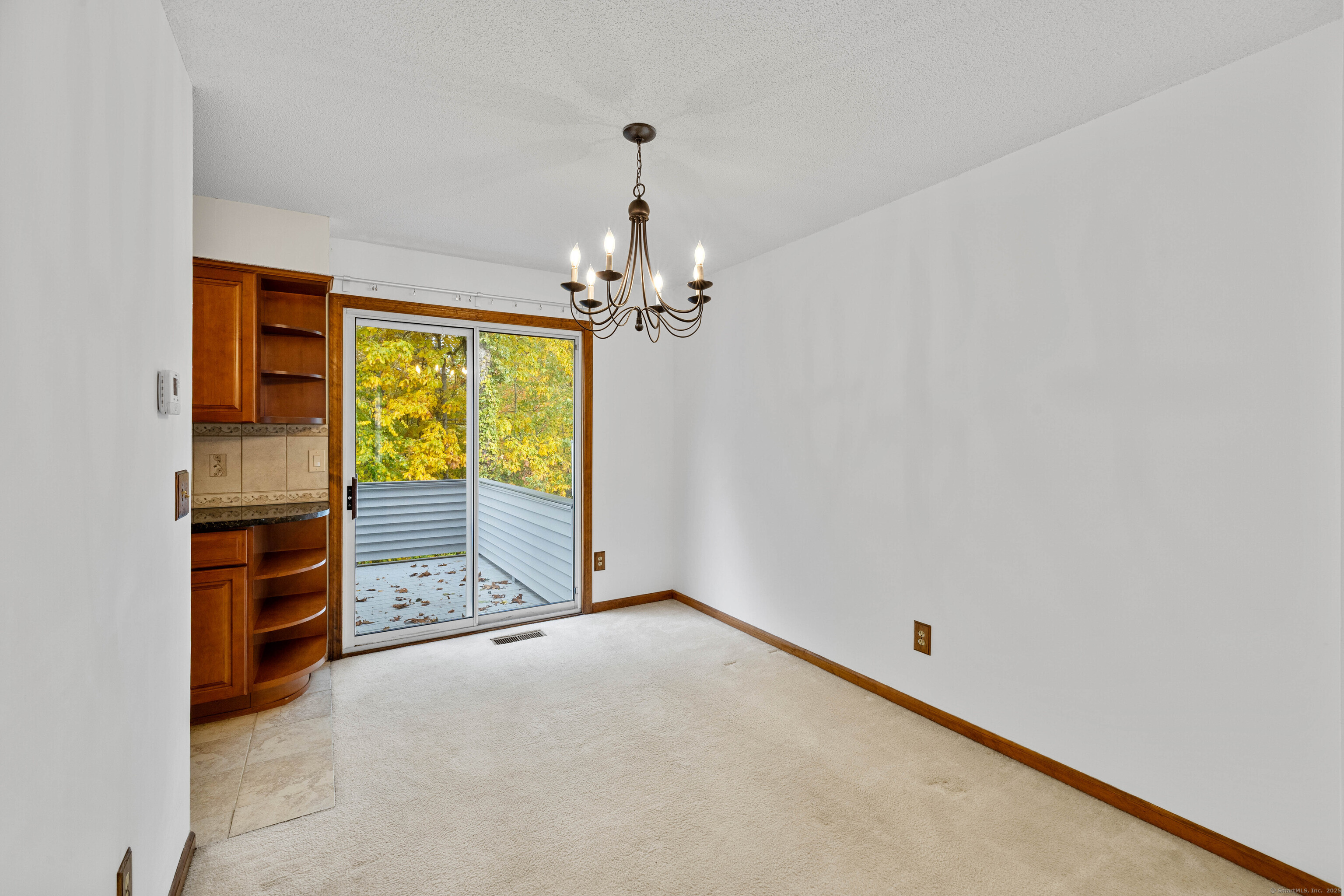 226 Austin Ryer Lane, Unit 226 Branford, CT 06405 - Photo 4 of 34 en empty room with windows