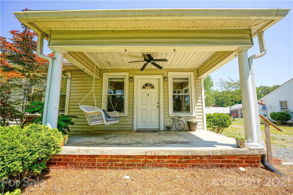 36 Bluff Avenue Southwest Concord, NC 28027 - Photo 1 of 18 a front view of a house with a porch
