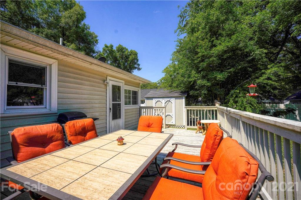 36 Bluff Avenue Southwest Concord, NC 28027 - Photo 16 of 18 a balcony view with two chairs and a table
