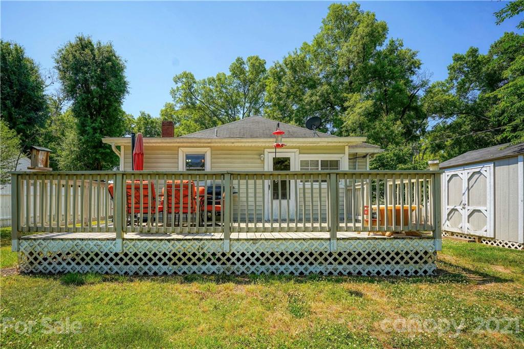 36 Bluff Avenue Southwest Concord, NC 28027 - Photo 17 of 18 a front view of a house with a garden