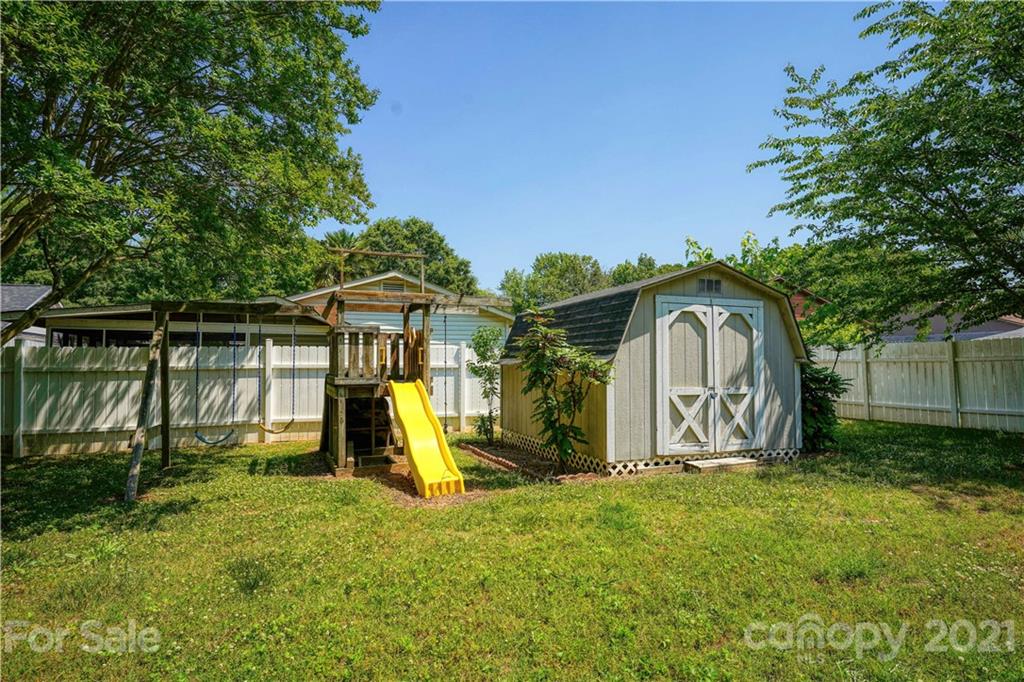 36 Bluff Avenue Southwest Concord, NC 28027 - Photo 18 of 18 a view of outdoor space with garden and entertaining space
