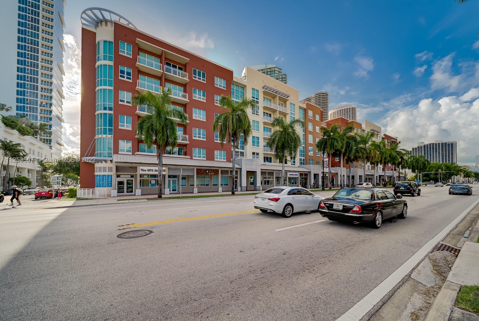 2001 Biscayne Boulevard, Unit 3401 Miami, FL 33137 - Photo 2 of 23 a car parked in front of a building