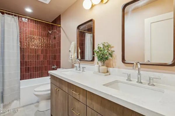 a view of a storage & utility room with washer and dryer